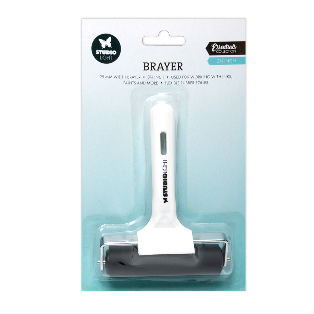 White brayer with black roller on a light blue packaging background